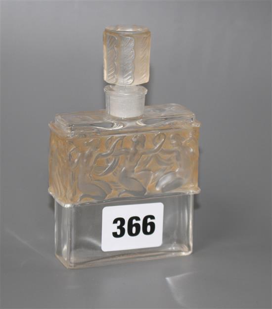 A Lalique for Molinard frosted glass scent bottle, decorated with a band of nudes, height 11.5cm